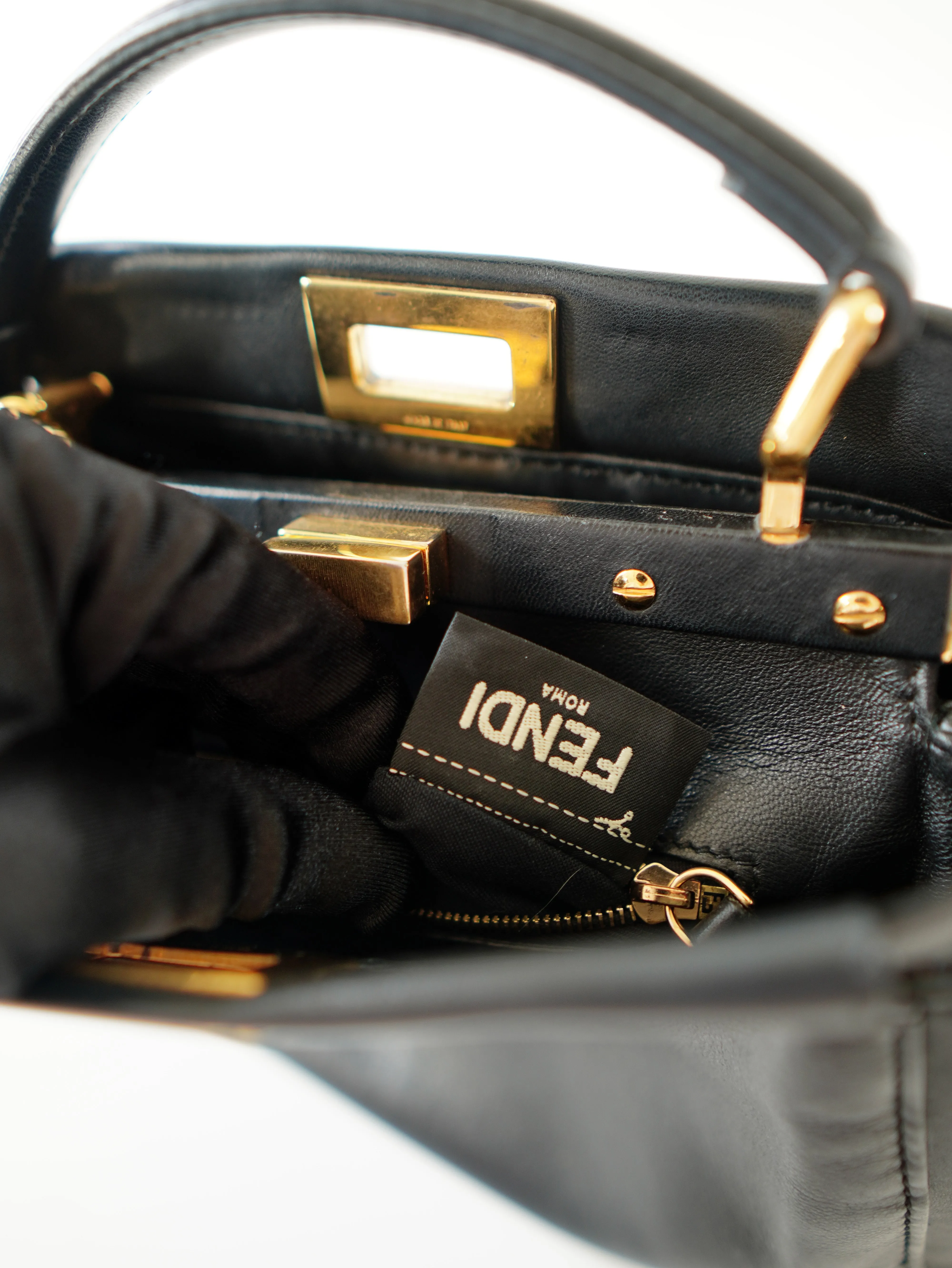 <b>FENDI</b> <br>Iconic Mini Peekaboo