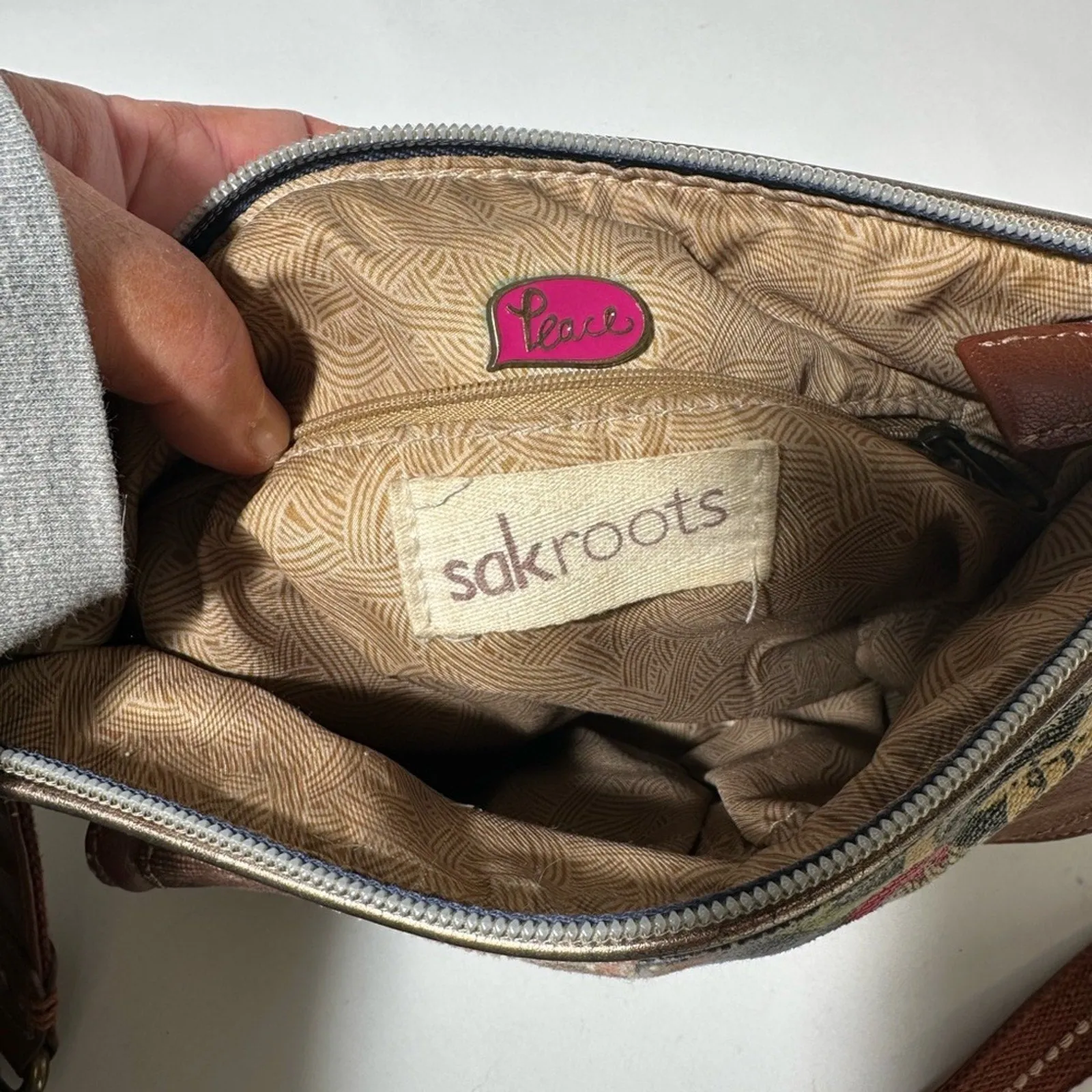 Sakroots Brown Crossbody Bag with Floral Design